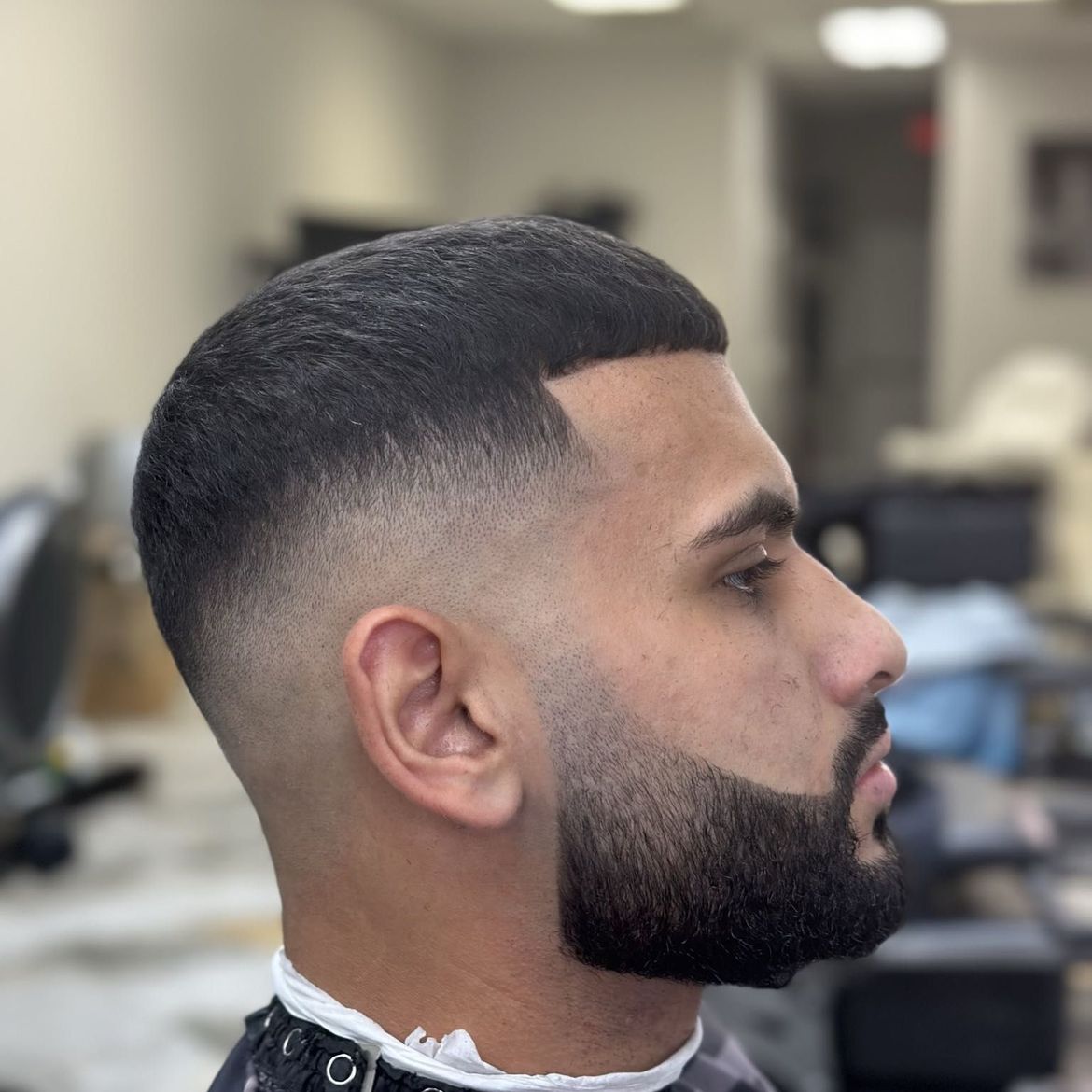 Middle Eastern man with professional fade and beard trim